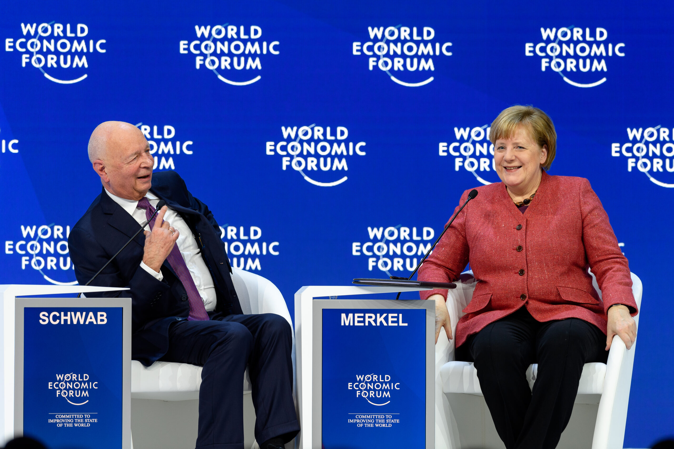 Angela Merkel, Federal Chancellor of Germany, Klaus Schwab, Founder and Executive Chairman, World Economic Forum speaking during the Session "Special Address by Angela Merkel, Federal Chancellor of Germany" at the Annual Meeting 2019 of the World Economic Forum in Davos, January 23, 2019. Congress Centre - Congress Hall. Copyright by World Economic Forum / Sandra Blaser