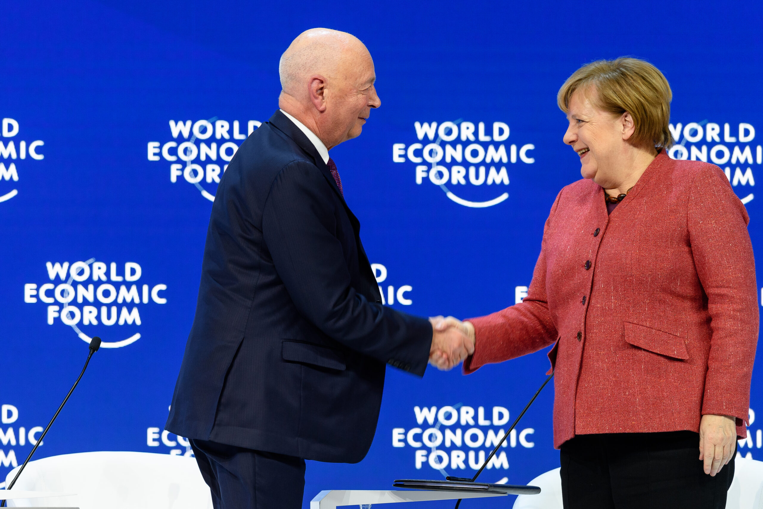 Angela Merkel, Federal Chancellor of Germany, Klaus Schwab, Founder and Executive Chairman, World Economic Forum speaking during the Session "Special Address by Angela Merkel, Federal Chancellor of Germany" at the Annual Meeting 2019 of the World Economic Forum in Davos, January 23, 2019. Congress Centre - Congress Hall. Copyright by World Economic Forum / Sandra Blaser